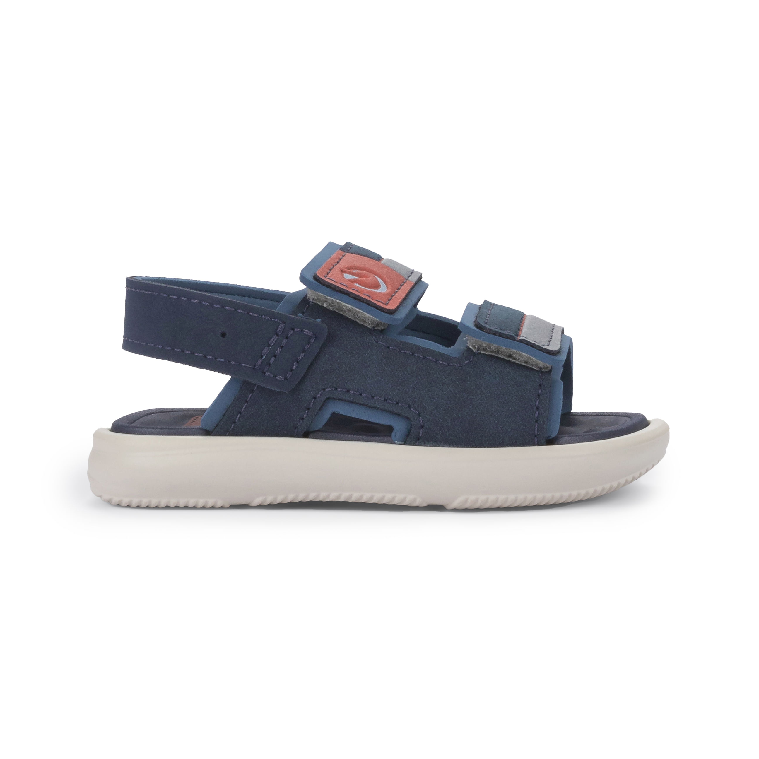 Papete infantil Grendene Kids nas cores bege, azul e vermelho, com tiras ajustáveis e solado antiderrapante